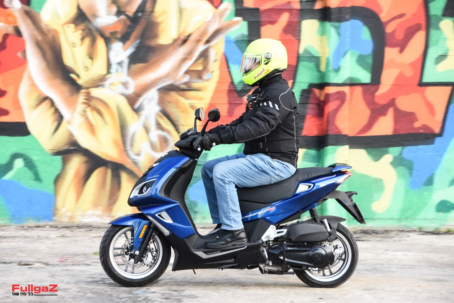 רכיבה ראשונה: פיג'ו ספידפייט 125